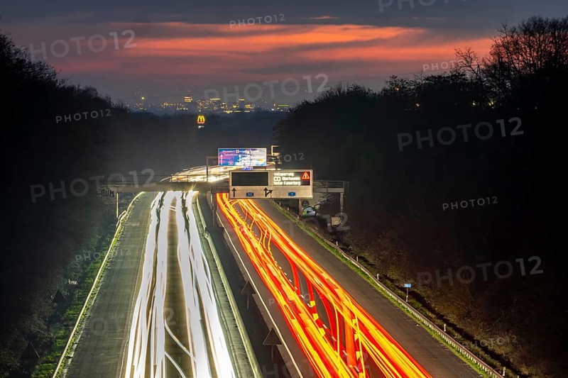 Evening traffic on the A52 motorway, between Düsseldorf and Essen, in front of the Breitscheid motorway junction, partly slow rush hour traffic, looking south, North Rhine-Westphalia, Germany