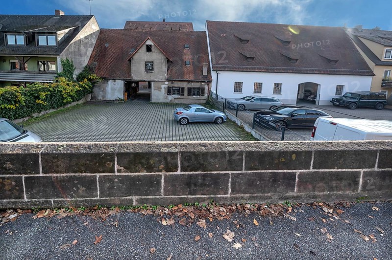 Historic city wall built in the 14th century, old town houses behind, Lauf an der Pegnitz, Middle Franconia, Bavaria, Germany