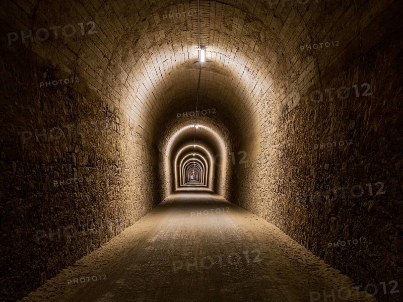Tunnel del Castillo, Coripe Mountain Tunnel, illuminated longest tunnel on cycle path Via Verde de la Sierra, Puerto Serrano to Olvera, old railroad track, Andalusia, Spain
