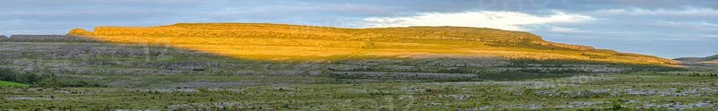Sunset over the karst landscape of the Burren, Keelhilla, Carran, County Clare, Ireland