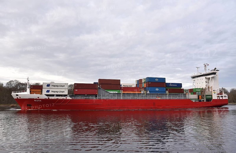 Container ship, RUTH sails in the evening in the Kiel Canal, NOK, Kiel Canal, Kiel Canal, Schleswig-Holstein, Germany