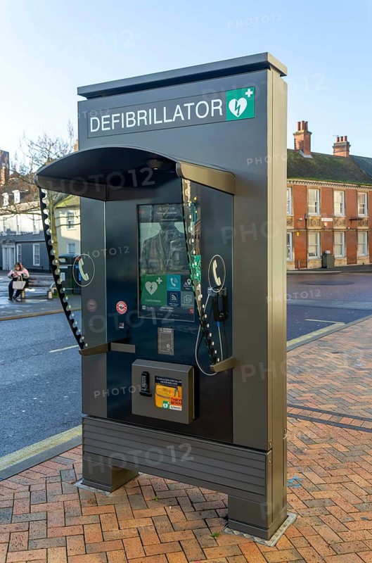 JCDecaux modern public access defibrillator station kiosk communication hub, town centre of Ipswich, Suffolk, England, UK