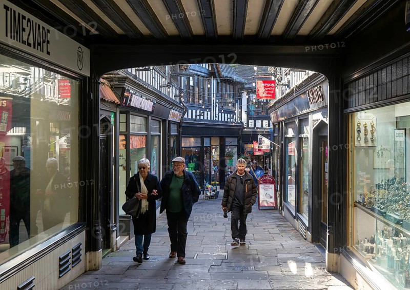 Shops and shoppers in The Walk shopping alleyway in town centre of Ipswich, Suffolk, England, UK