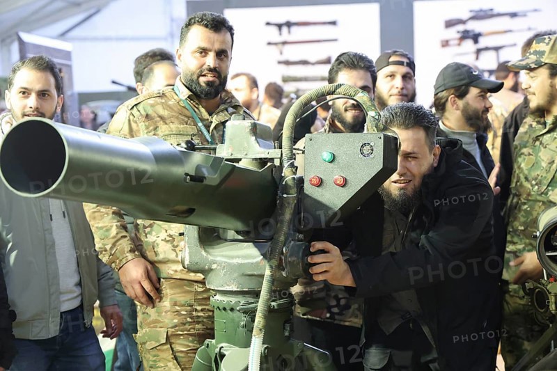 On 07 December 2025, in Damascus, Syria, a military exhibition showcased armored vehicles, weapons, and defense equipment, offering visitors an insight into the country's developing military industry. The event drew officials, diplomats, and attendees, coinciding with the first anniversary of Assad's fall, and highlighted advancements in locally produced military technology, Damascus, Damascus, Syria
