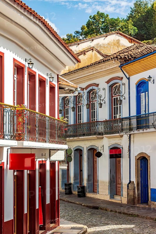 Old mansions and cobblestone paving on the historic streets of Ouro Preto, Ouro Preto, Minas Gerais, Brazil
