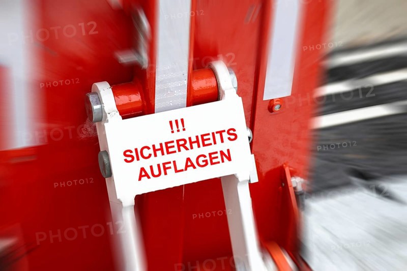 (Photo montage) Close-up of an anti-terrorist lock at a Christmas market with added text SAFETY REQUIREMENTS
