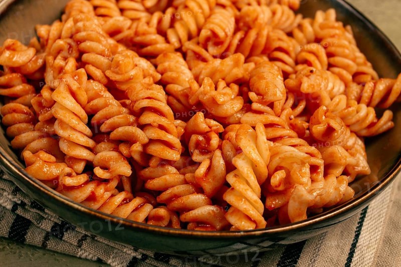 Fusilli pasta dish, made with tomato sauce, homemade, no people