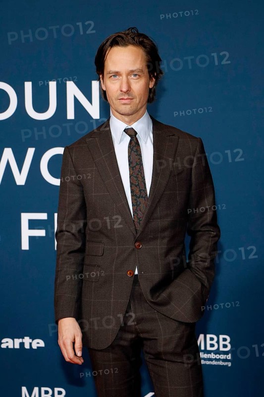 Tom Schilling at the festival opening and the premiere of the movie 'Sentimental Value' at the 20th World Cinema Festival Around the World in 14 films at the cinema at KulturBrauerei in Berlin on 28.11.2025