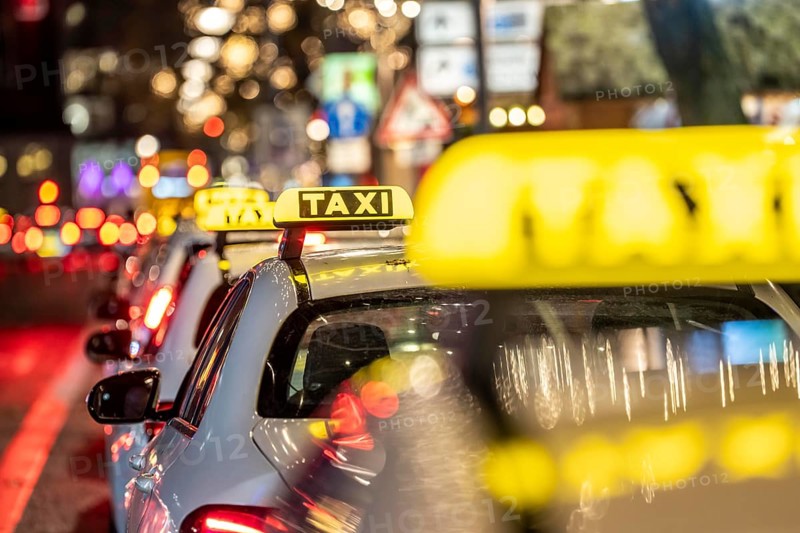 Taxi stop, on Tauentzienstraße in Berlin, in the evening, Germany
