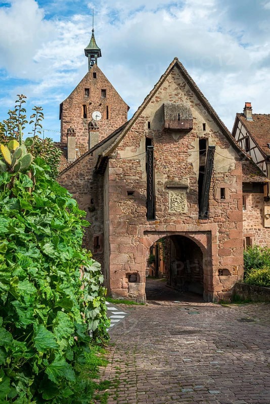 The entrance portal on the city wall of the historic town of Riquewihr, Ellsass