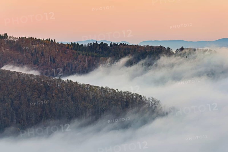 View from the Gisliflue of the Jura foothills covered in fog, in the light of dawn, Talheim, Canton, Aargau, Switzerland