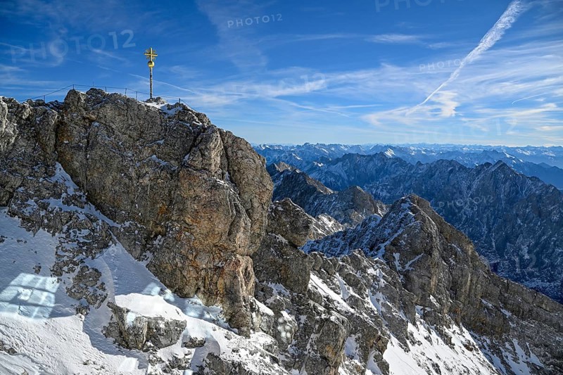 Zugspitze summit cross (2962 m), in the background the Wetterstein Mountains, Grainau municipality, Garmisch-Partenkirchen district, Bavaria, Germany