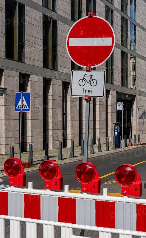 Barriers and signs with traffic signs at road construction sites in Berlin Mitte, Berlin, Germany