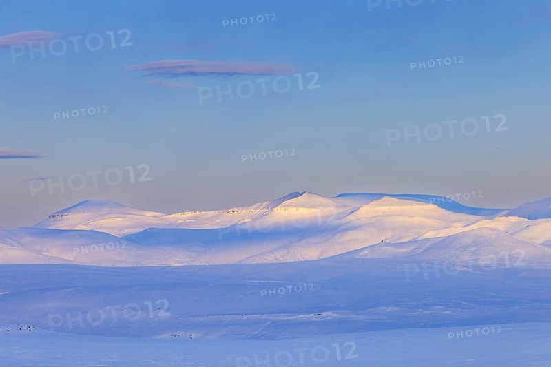 Snow covered mountains in Arctic landscape at Mohnbukta, bay at the western shore of Storfjorden in Sabine Land at Spitsbergen, Svalbard