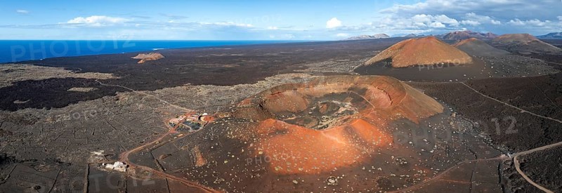 Montaña Quemada and Montaña Pedro Perico volcanoes, volcanic landscape with craters and lava fields, aerial view, Lanzarote, Canary Islands, Spain