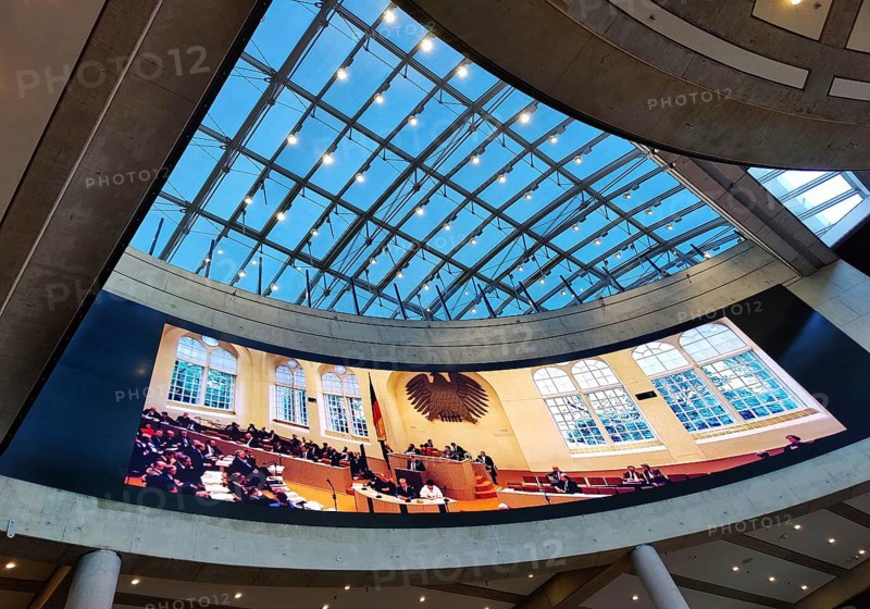 Entrance area in the House of History with the projection of the Bundestag in the old plenary hall in the Wasserwerk, Bonn, North Rhine-Westphalia, Germany