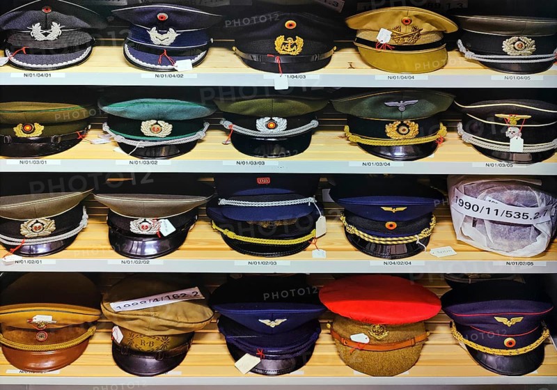 Collection of official caps in the textile depot, House of History, Bonn, North Rhine-Westphalia, Germany