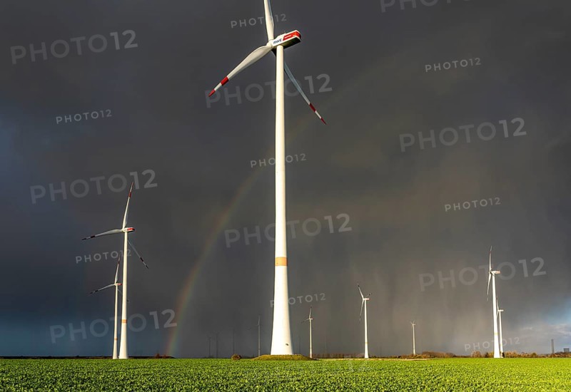 Königshovener Höhe onshore wind farm, on the A44 motorway near Bedburg, in front of the Jackerath triangle, autumn, rainbow, dark rain clouds, recultivated open-cast mining area, Garzweiler open-cast lignite mine, operated by RWE and the city of Bedburg, North Rhine-Westphalia, Germany