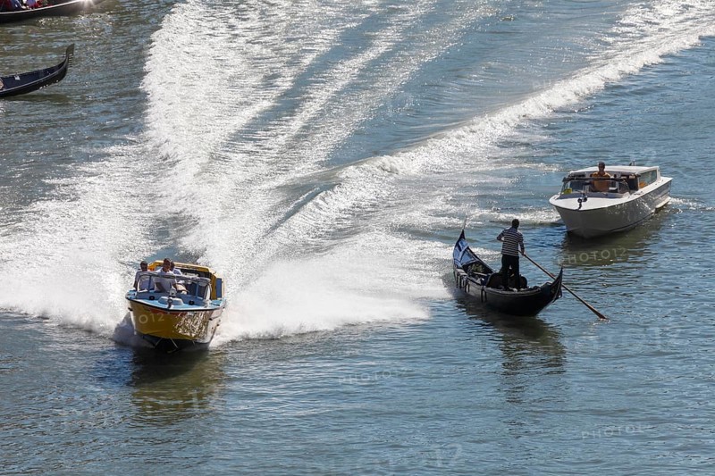 Ambulance boat in action on the Grand Canal, Rialto, Venice, Veneto, Italy