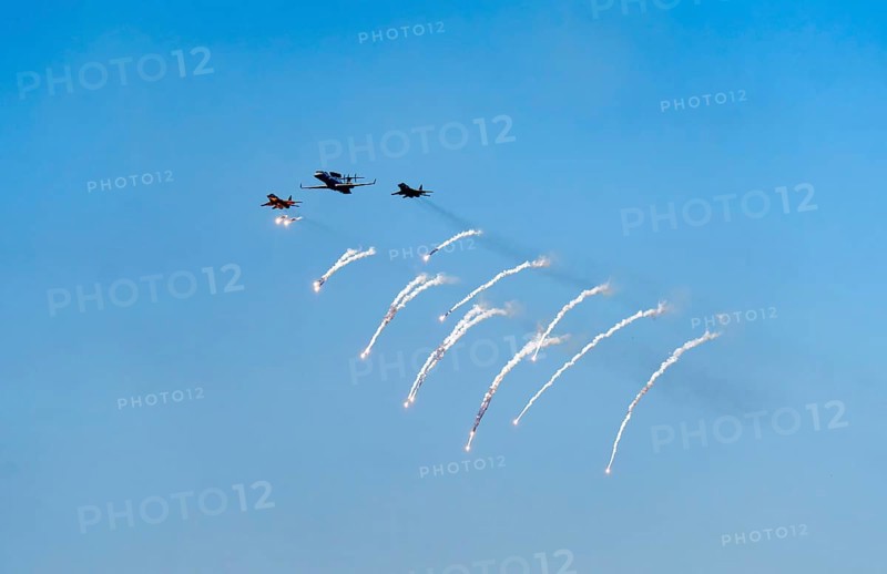 The Indian Air Force aerobatic team performs during an air show as part of the 93rd Air Force Day celebrations on November 8, 2025 in Guwahati, India