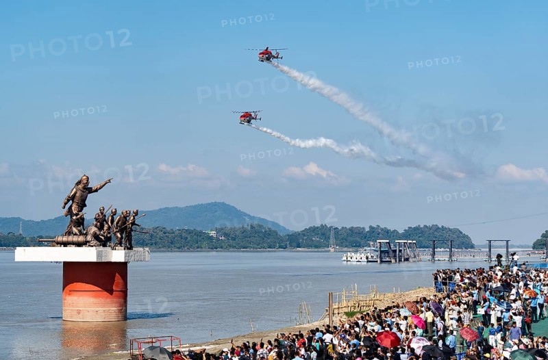 Indian Air Force (IAF) ALH Mk1 Sarang helicopters soar through the sky during an air show as part of the 93rd Air Force Day celebrations on November 8, 2025 in Guwahati, India