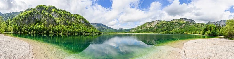 Landscape of Lake Offensee after rain when the sun comes through the clouds in spring, Salzkammergut, Austria