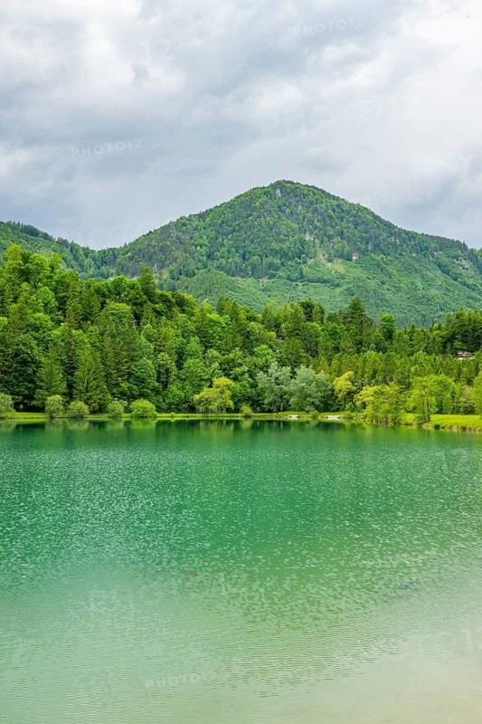 Landscape of Lake Elisabethsee on a rainy day in spring, Austria