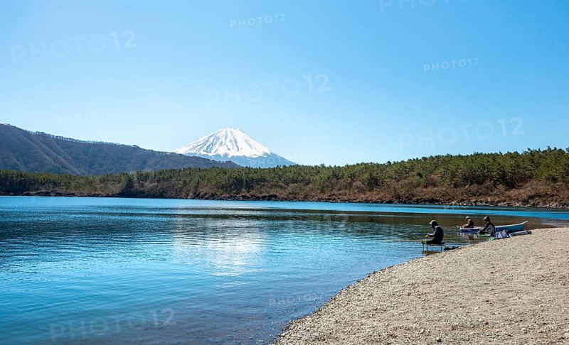 Anglers at Lake Saiko, behind volcano Mt. Fuji, Minamitsuru District, Yamanashi Prefecture, Japan