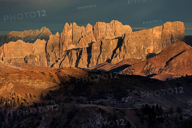 Steep mountains, mountain range, sunset, cloudy, autumn, Pordoi Pass, view of Croda da Lago, Dolomites, Italy