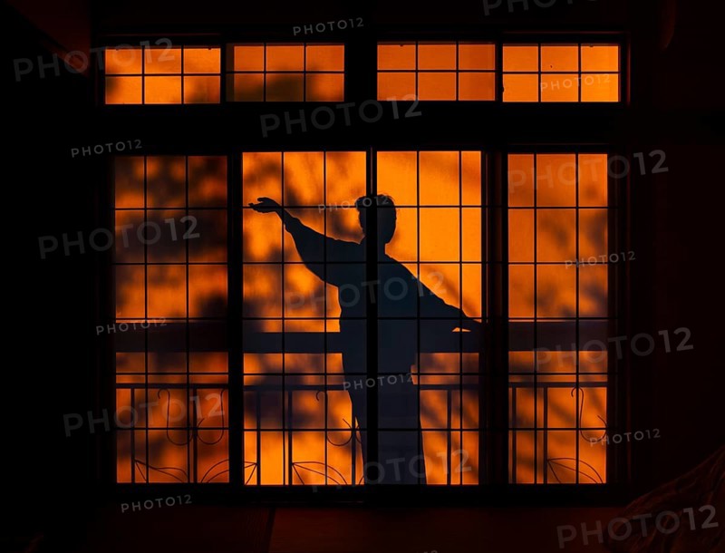 Shadows of a woman in kimono, on the balcony behind sliding shoji doors in a traditional Japanese house, ninja, Yamanouchi, Nagano, Japan