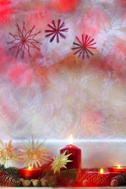 Christmassy decorated iced window, candle light, straw stars, Germany