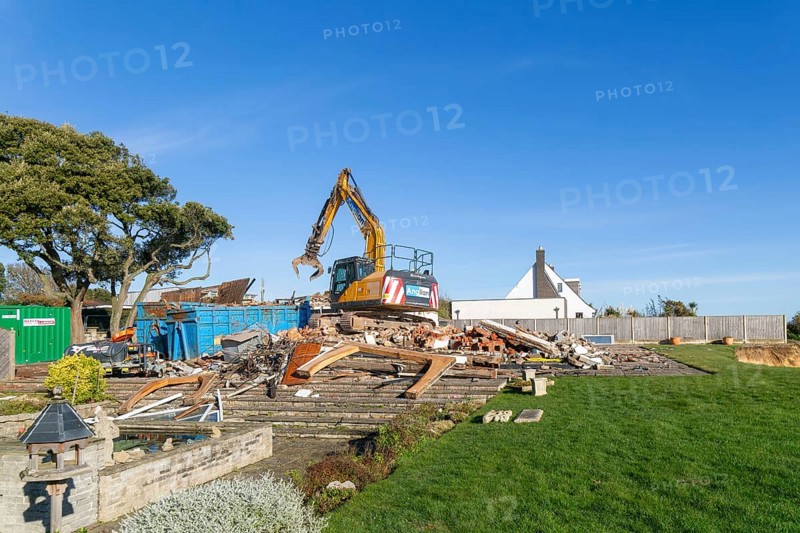 Demolition of Jean Flick's house, The Warren, Thorpeness, Suffolk, England, UK due to rapid coastal erosion of the North Sea coast, October 2025
