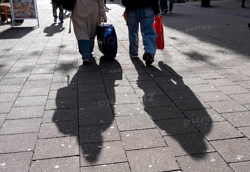 Shadows of passers-by shopping in the city center, Essen, North Rhine-Westphalia