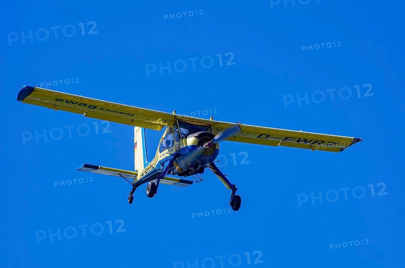 A PZL-104 Wilga-35A sport aircraft from Fliegerklub Kamenz with registration D-EWRZ during a flight demonstration as part of an air show on Rossfeld in Metzingen-Glems, Baden-Württemberg, Germany, for editorial use only