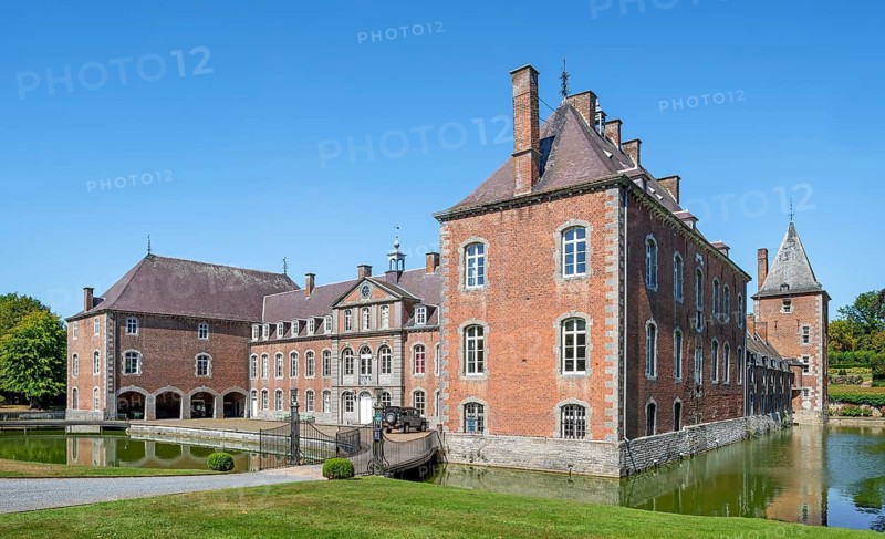 16th century Classicist Château de Franc-Waret in Louis XV style, moated castle in the village Fernelmont, province of Namur, Wallonia, Belgium