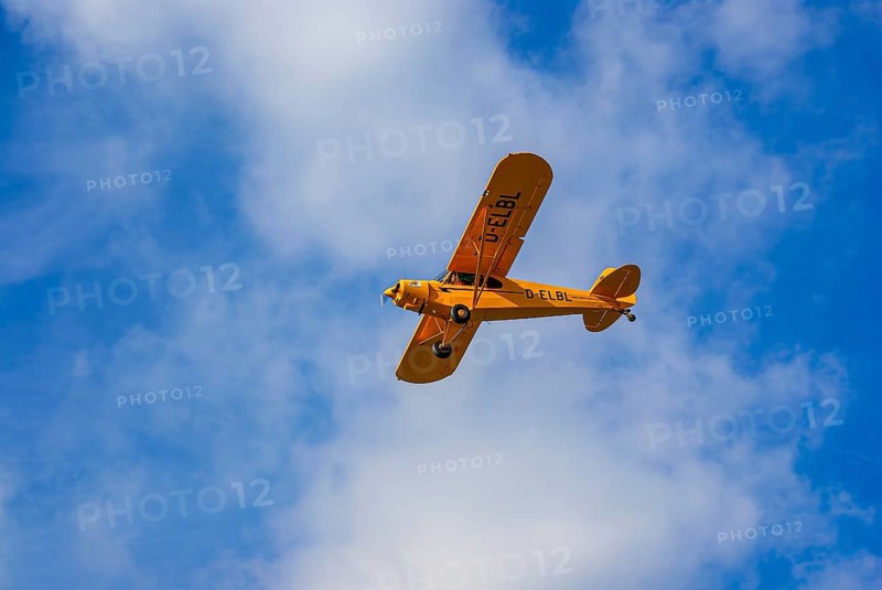 A Piper PA-18 Super Cub of the Bravo Lima Formation during a flight demonstration as part of an air show at the Rossfeld in Metzingen-Glems, Baden-Württemberg, Germany, for editorial use only