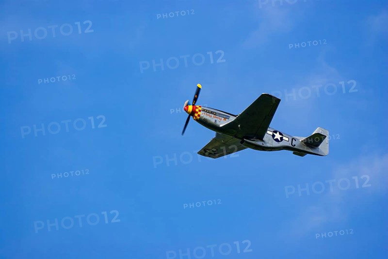 A North American P-51 Mustang of the flying group Flying Bulls, the Nooky Booky IV during an air show at the Rossfeld in Metzingen-Glems, Baden-Württemberg, Germany, for editorial use only