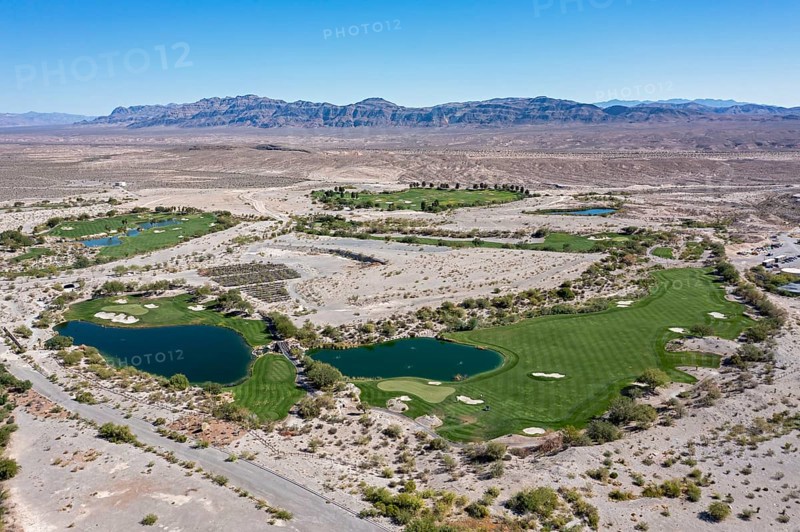 Coyote Ssprings - The Coyote Springs golf course in the Nevada desert. The Jack Nicklaus-designed course was originally to be surrounded by a planned community of 160, 000 homes. The golf course opened in 2006 but the homes were never built