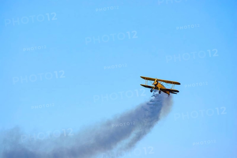 A Boeing-Stearman biplane during a flight demonstration as part of an air show at the Rossfeld in Metzingen-Glems, Baden-Württemberg, Germany, for editorial use only