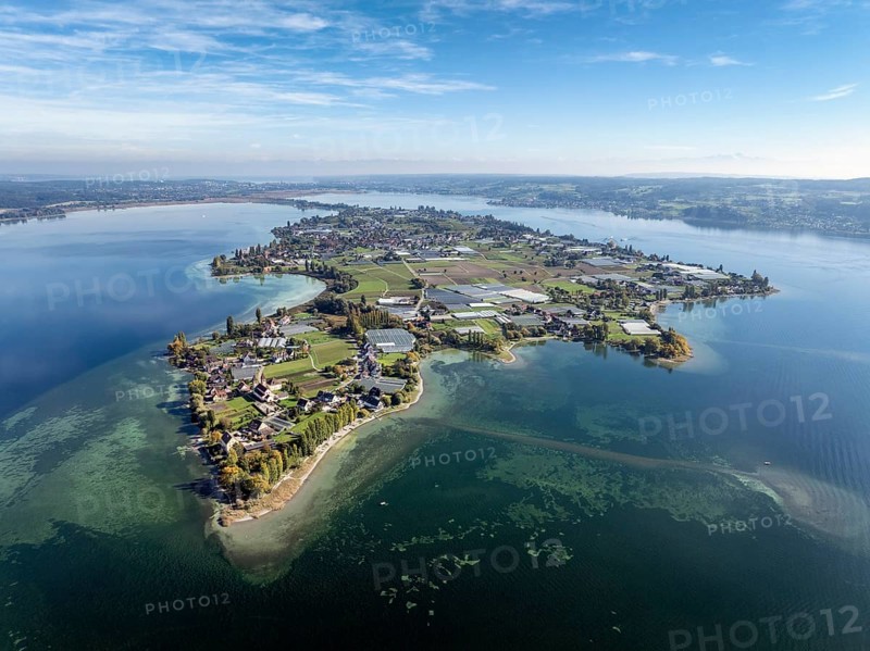 Aerial view of the north-western tip of the island of Reichenau in Lake Constance, with the district of Niederzell and the columned basilica of St Peter and Paul, Windegg Castle on the shore, district of Constance, Baden-Württemberg, Germany
