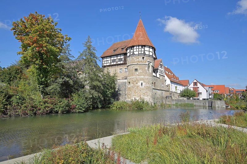 Zollern Castle built around 1255 with water tower on the Eybach stream, half-timbered house, autumn, castle, Balingen, Swabian Alb, Baden-Württemberg, Germany