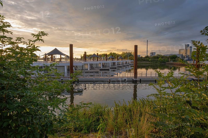 View of house messengers at Lankenauer Höft at Neustadt harbour in the evening light, Weser, Bremen, Germany