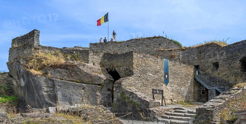 9th century medieval ruined hill castle overlooking the city La Roche-en-Ardenne in summer, province of Luxembourg, Ardennes, Wallonia, Belgium