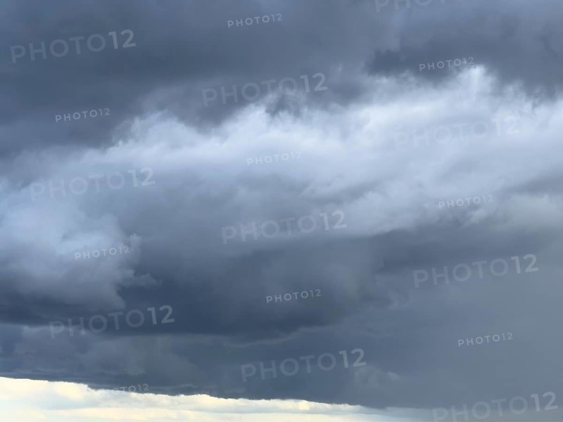 Gathering low pressure area with rain front dark stratus clouds Nimbostratus clouds, international