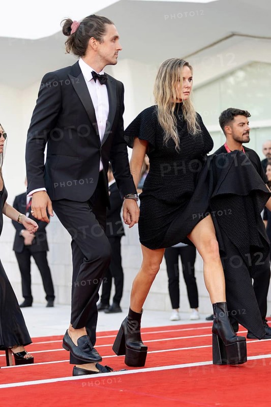 Venice, Italy - 2 September 2025: Rory St. Clair Gainer, Rebecca Ferguson during the Red Carpet of - A house of Dynamite - during the 82nd Venice International Film Festival