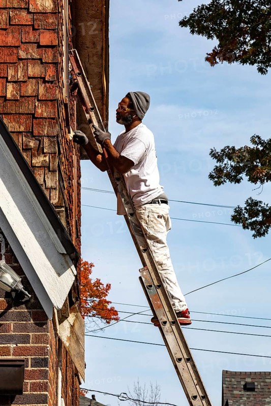 Detroit, Michigan - Workers remodel a house in the Morningside neighborhood that had been vacant for many years. Detroit lost nearly two-thirds of its residents from 1950 to 2020 but has been growing modestly in recent years