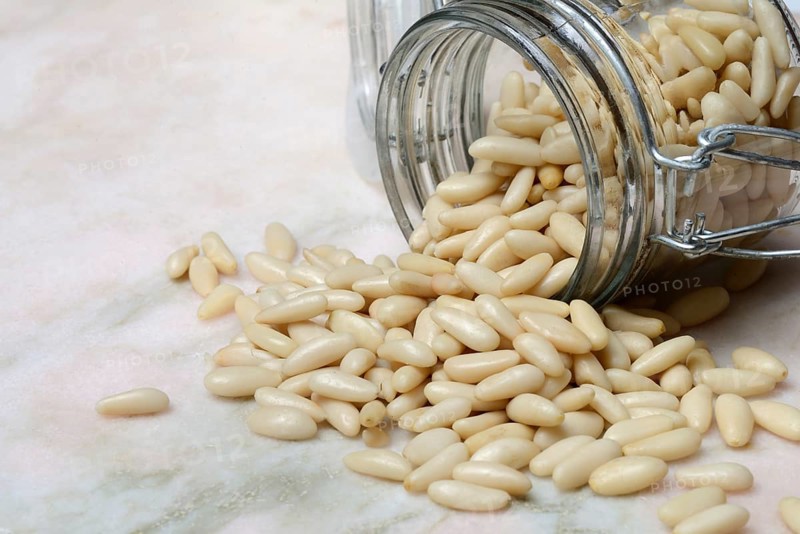 Pine nuts in glass containers, Pinus pinea