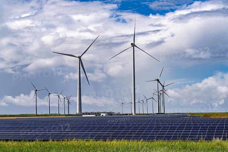 Vopak Solarpark Eemshaven, 19 hectares of solar modules with a capacity of 25 megawatts, around the Vopak tank terminal in the industrial harbour of Eemshaven, wind farm, Netherlands