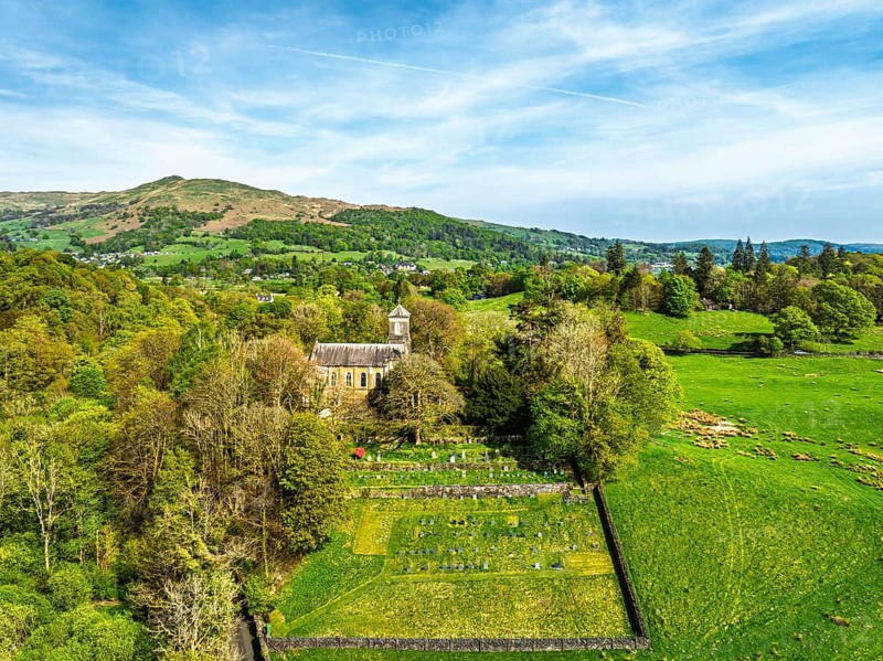 Holy Trinity Church from a drone, Bog Lane, Brathay village, Lake District, Cumbria, England, United Kingdom