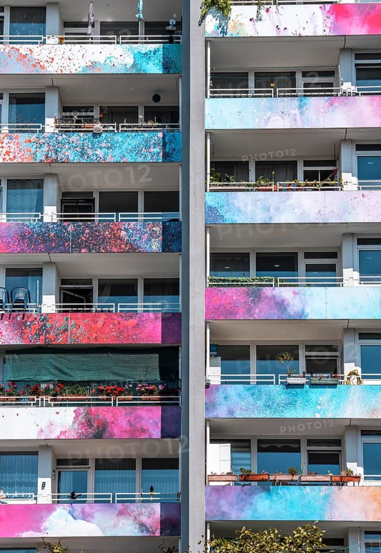 High-rise residential building, in Essen-Steele, with colourfully designed façade, balcony balustrades, after renovation, North Rhine-Westphalia, Germany